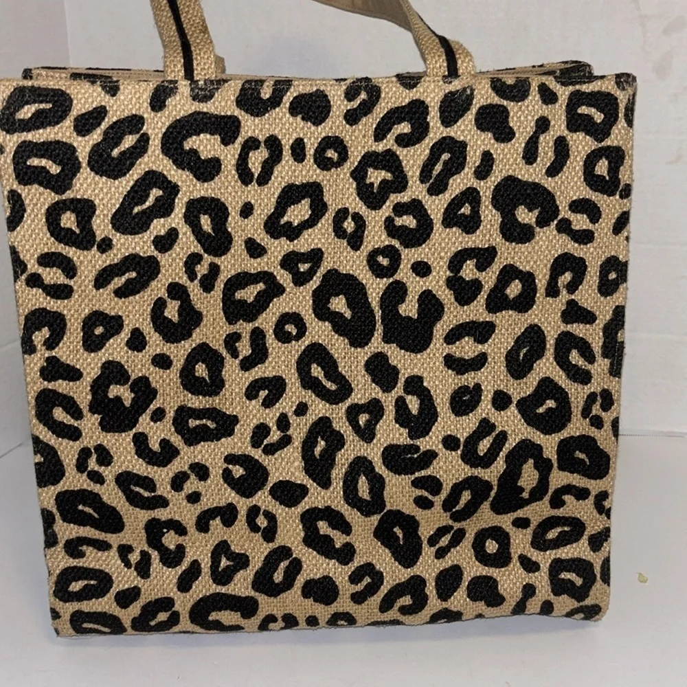 AMERICA & BEYOND TAN AND BLACK LEOPARD PRINT JUTE/CANVAS TOTE WITH TASSEL